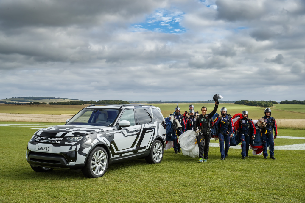 Watch Bear Grylls jump out of a plane to test Land Rover’s new Discovery seat folding app