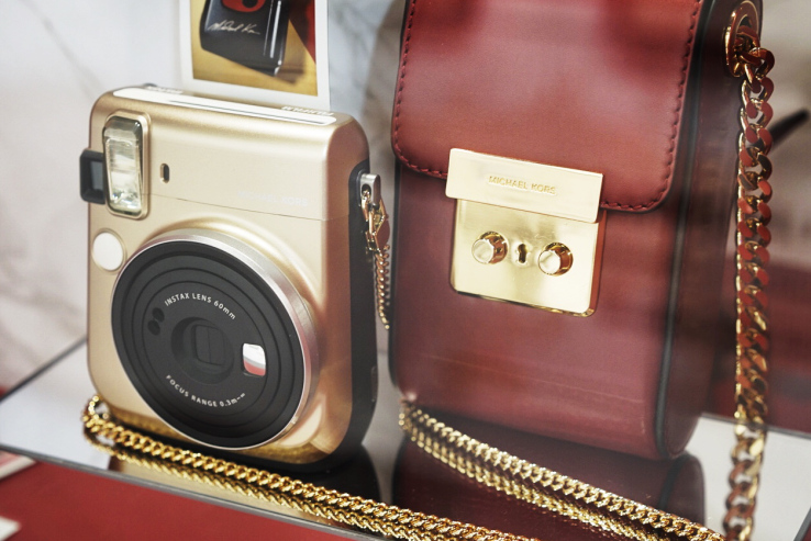 Michael Kors lends its name to a gold-colored Fujifilm instant camera