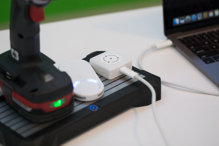 Fli Charge demonstrates its charging pad with Craftsman power tools